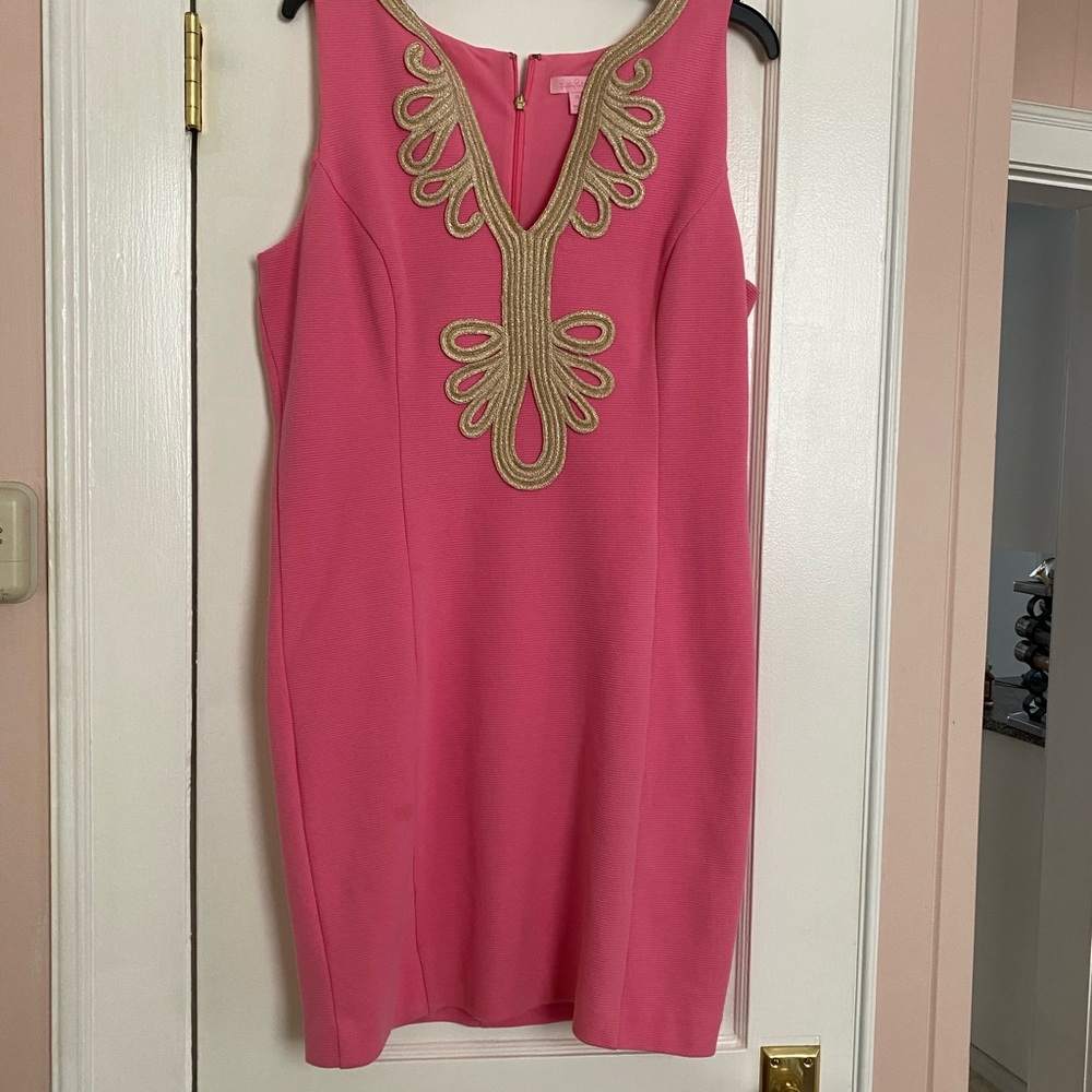 Lily Pulitzer dress xl or 12 length 37”bust 16. Hip 18 water spot on front.